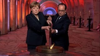 Hollande et Merkel dans la nef de lossuaire de Douaumont [upl. by Ranna]