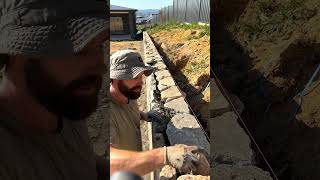 completing a retaining wall in 10 days stonework mason retainingwalls [upl. by Wallach]