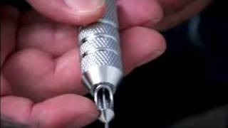 Beginning Tattooing Tips  How to Insert Needles Into Traditional Tattoo Machine [upl. by Eerdua]