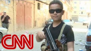 Child fighter with AK 47 on Syria border [upl. by Clarita]