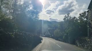 Driving UK Driving into the town of Grasmere towards Allan Bank House [upl. by Barta22]