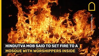 Hindutva mob set fire to a mosque with worshippers still inside [upl. by Airdnek336]