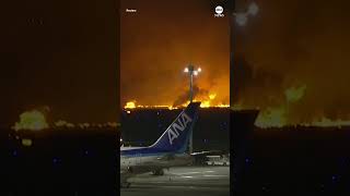 Japan Airlines plane bursts into flames at Tokyo airport [upl. by Enilesoj]