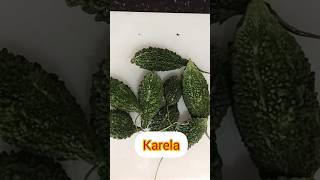 भरवा करेिला बनाने का आसान तरीका BharwaKarela recipe Tasty Karela sabji shortsshortsfeed recipe [upl. by Nomael]