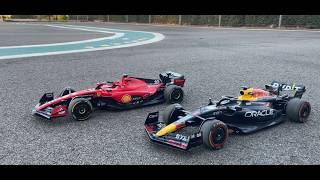 Racing the new Costco Maisto F1 Ferrari and Red Bull RC Toys Awesome details on these Formula1 cars [upl. by Fotzsyzrk]