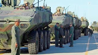 ACV amphibious combat vehicles are loaded onto a US Navy landing craft [upl. by Rikki]