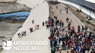 Caos en frontera con Tijuana Cientos de migrantes de la caravana intentan cruzar a la fuerza a EEUU [upl. by Tally]