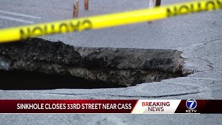 Huge sinkhole opens in middle of Omaha street causing road closure [upl. by Akira]