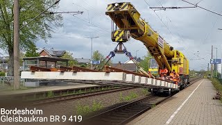 Bordesholm Vorbeifahrt STRABAG Gleisbaukran KRC 910 BR 9419 aka auf Betriebsfahrt [upl. by Murphy81]