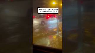 Torrential rain inundates roads in Valencia Spain [upl. by Nauqan]