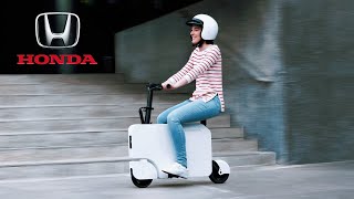 Honda’s New Motocompacto EScooter Looks Like a Rideable Suitcase [upl. by Ahsilek]