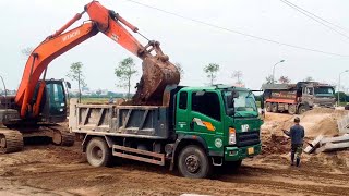 River embankment construction project excavators road rollers construction site dump trucks [upl. by Thetisa]