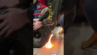 How to put a tire back on a rim with starting fluid and a lighter [upl. by Einna]