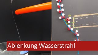 Ablenkung des Wasserstrahls am elektrostatisch aufgeladenen Kunststoffstab 3 Gym [upl. by Yromem136]