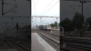 Dust Storm by BGKT WAP7 honks in High Speed 18573 Vishakhapatnam  Bhagat Ki Kothi Express [upl. by Neelhtakyram398]