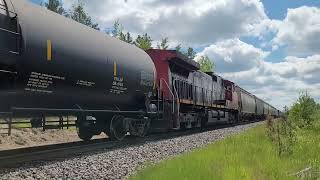 A 🔥 🥵 afternoon and CN manifest M348 is rolling up the grade into Baynham Manitoba [upl. by Nadya63]