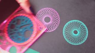 Using a spirograph on black paper [upl. by Annaej861]