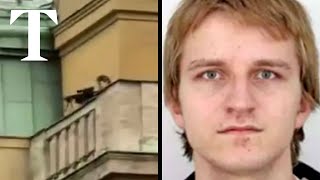 Moment Prague gunman fires from rooftop during mass shooting [upl. by Zachar563]