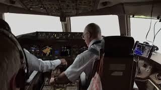 777 cockpit viewWith ATC audio… NGOLAXthrough dissipating tropical storm  push to top of climb [upl. by Emmeline]