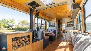 Incredible Bus Conversion  Tiny Home on Wheels [upl. by Wier]