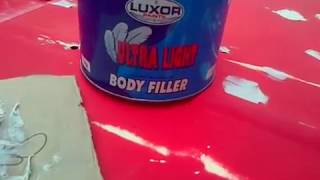 Car panel repair with body filler Luxor ULTRA LIGHT filler [upl. by Jagir48]