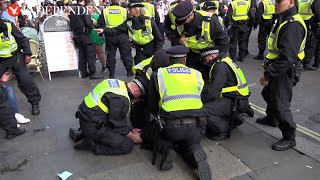 Police clash with Tommy Robinson supporters as nine arrested [upl. by Lodmilla674]