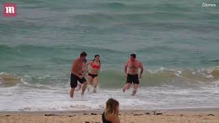 Hugh Jackman shows off rippling muscles as he takes a dip at Bondi [upl. by Seaddon533]