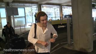 Harry Styles arrives at Heathrow from Los Angeles [upl. by Lawan]