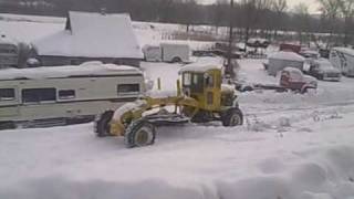 Snowplowing with Austin Western grader [upl. by Tigirb]