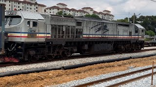 KTMB Class 26106 Tanjung Jara locomotive with container and flatbed wagons arriving from North Port [upl. by Sharla]