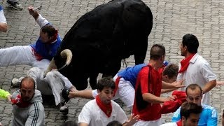 Two Gored in Spains Pamplona Bull Run [upl. by Eveivenej]