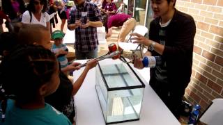 Collapsing Soda Can  Demonstration at TAMU Physics and Engineering Festival 2013 [upl. by Marquita82]