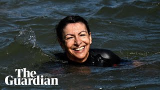 Paris mayor swims in the Seine to show its clean enough for Olympic swimming events [upl. by Ogirdor153]