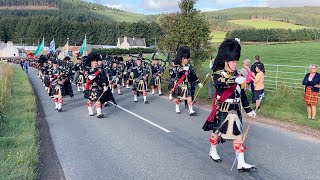 Lonach Highlanders marching through Strathdon in Scotland during 2022 Lonach Gathering in Scotland [upl. by Anerak651]