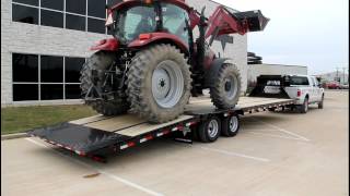 PJ Gooseneck Hydraulic Dovetail Loading a Case IH Maxxum 130  PJ Trailers [upl. by Bilow]