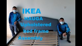 IKEA HAUGA Upholstered bed frame Assembly [upl. by Onitnelav201]