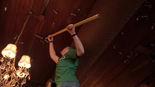 Annual ceiling sweep at Kells Irish Pub raises money for children in need [upl. by Oilla]