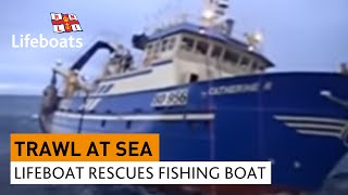 Lifeboat rescues large fishing vessel in rough seas [upl. by Emery558]