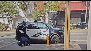 Injured man left in front of city council office by two police officers [upl. by Nylyrehc]