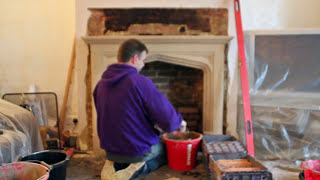 How to install a Limestone fireplace mantel and wood burning stove [upl. by Anicart527]