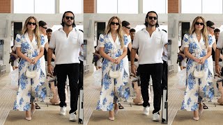 Sydney Sweeney exudes elegance in a white and blue floral jumpsuit as she and her fiancé Jonathan [upl. by Yrdua892]