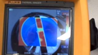 Infrared thermography demo  electrical tape on a hot pan [upl. by Ainollopa493]