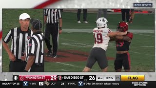 Washington State punter shoves players after roughing penalty 🤣 [upl. by Eniladam]