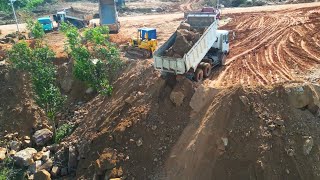 Technique Skills Land Filling On The Mountain 10 Wheels Trucks Unloading amp Bulldozer Pushing Stone [upl. by Llennehc37]