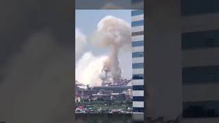 Moment huge explosion captured onboard ship in Chinese port [upl. by Ynohtnaed]