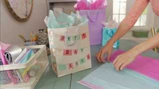 Giftology How to Fill a Gift Bag with Tissue [upl. by Lyrret]