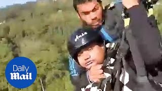 Hero pilot saves man after their paraglider SNAPS mid air [upl. by Yendroc82]