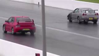 R34 Nissan Skyline vs Mitsubishi Evo 9  14 Mile Drag Race JapShow 2018 [upl. by Harley]