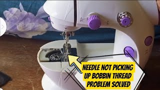 Mini sewing machine needle not catching the bobbin thread problem solved [upl. by Avril57]