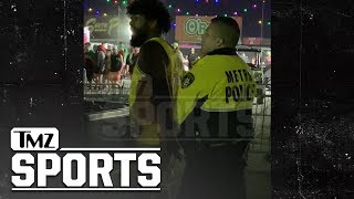 Ezekiel Elliott Handcuffed at EDC Vegas After Knocking Man to the Ground  TMZ Sports [upl. by Agripina]